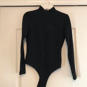 Long sleeve open back black body suit